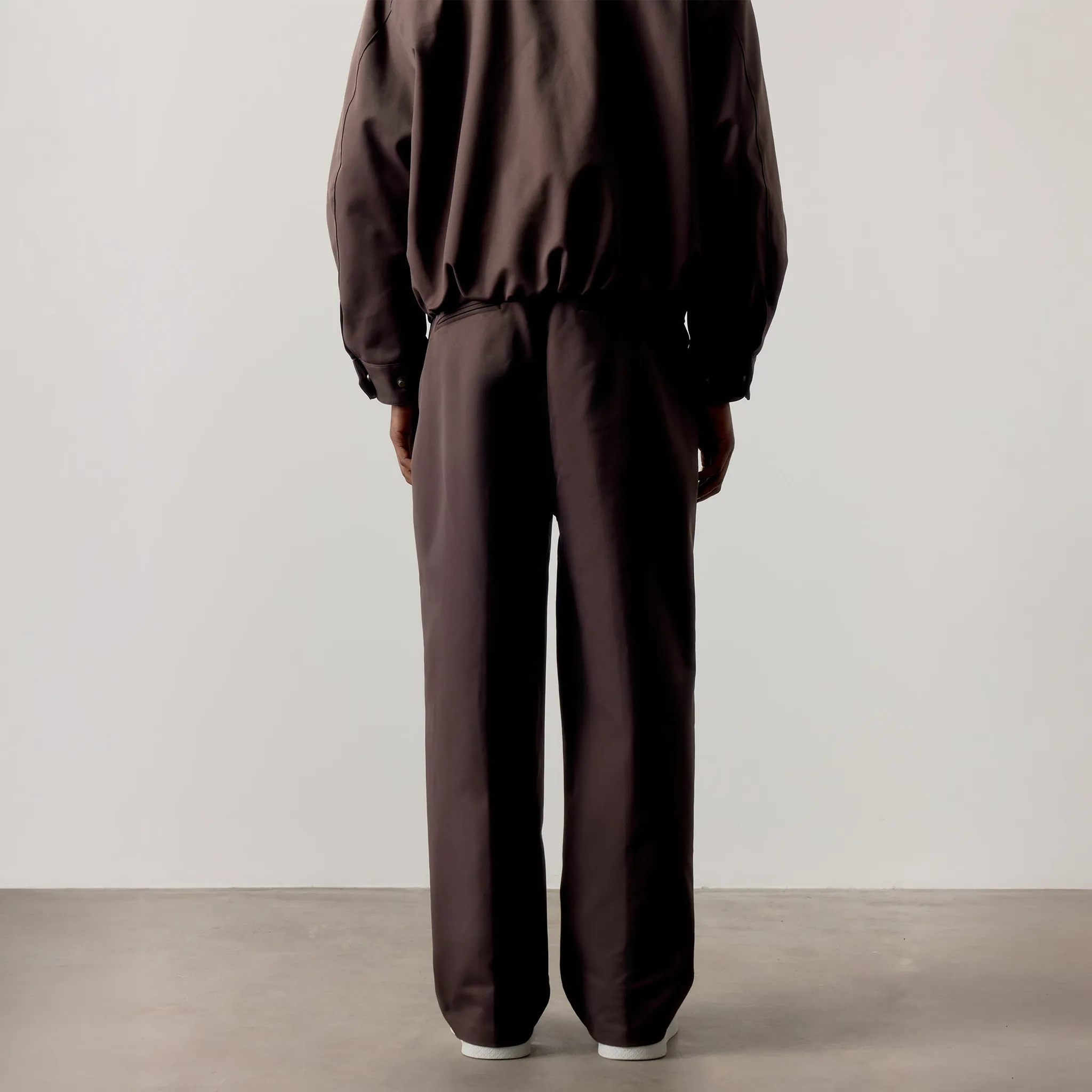 Model Back View of The Couture Club Rivet Detail Brown Trousers
